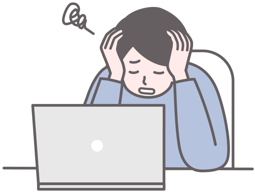 パソコンの前で頭を書かせている男性のイラスト